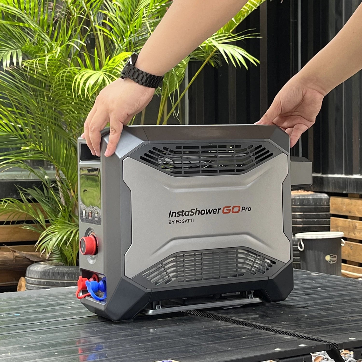 Fogatti InstaShower Go Pro portable camp water heater for efficient outdoor hot water use.